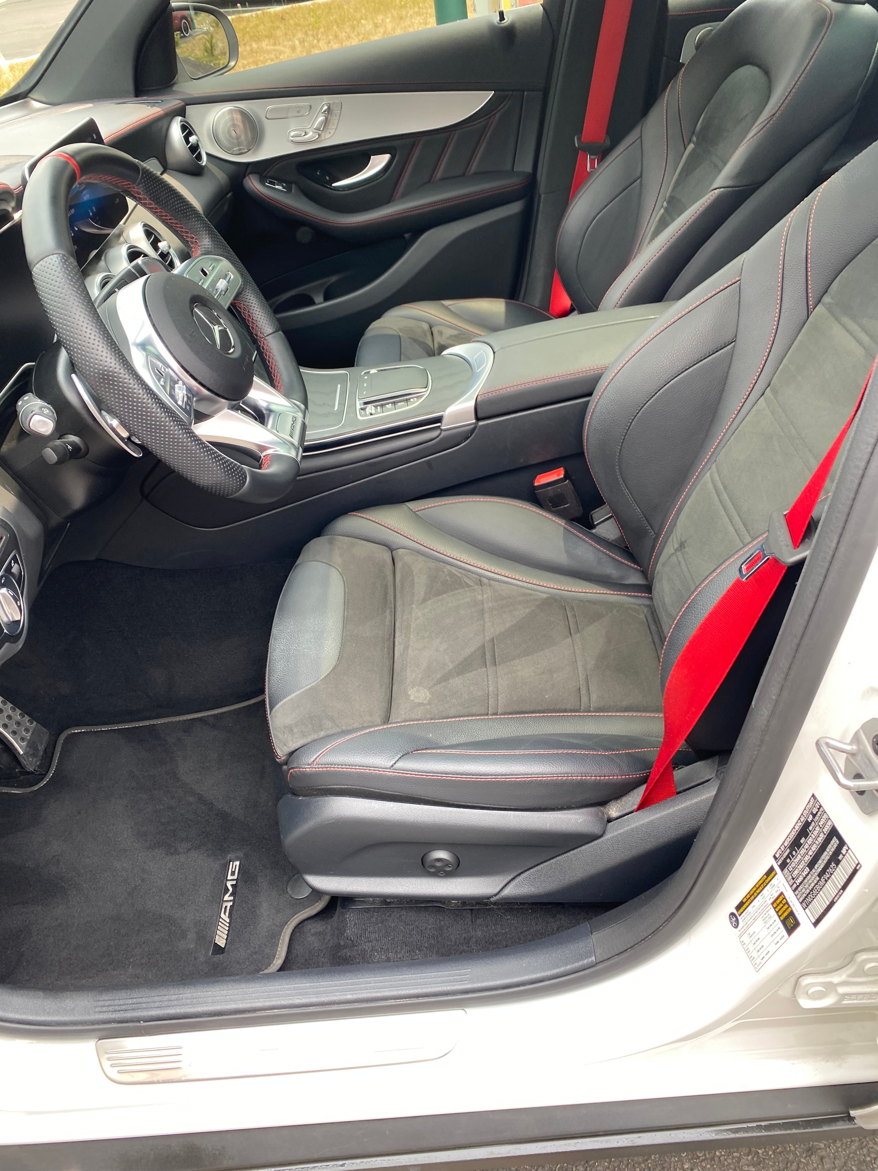 Obsidian Detailing — Mercedes-AMG interior steering wheel and seats with red stitching